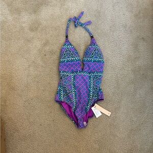 Nanette Lepore blue and purple one piece swimsuit, flattering cut with tie back